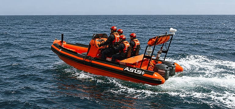 Orange Rescue Boat on Open Sea