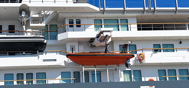 Orange SOLAS rescue boat on deck